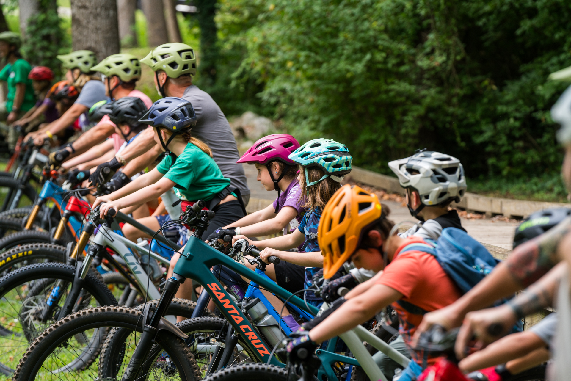 Kids and mentors on bikes during Trail Blazers program.