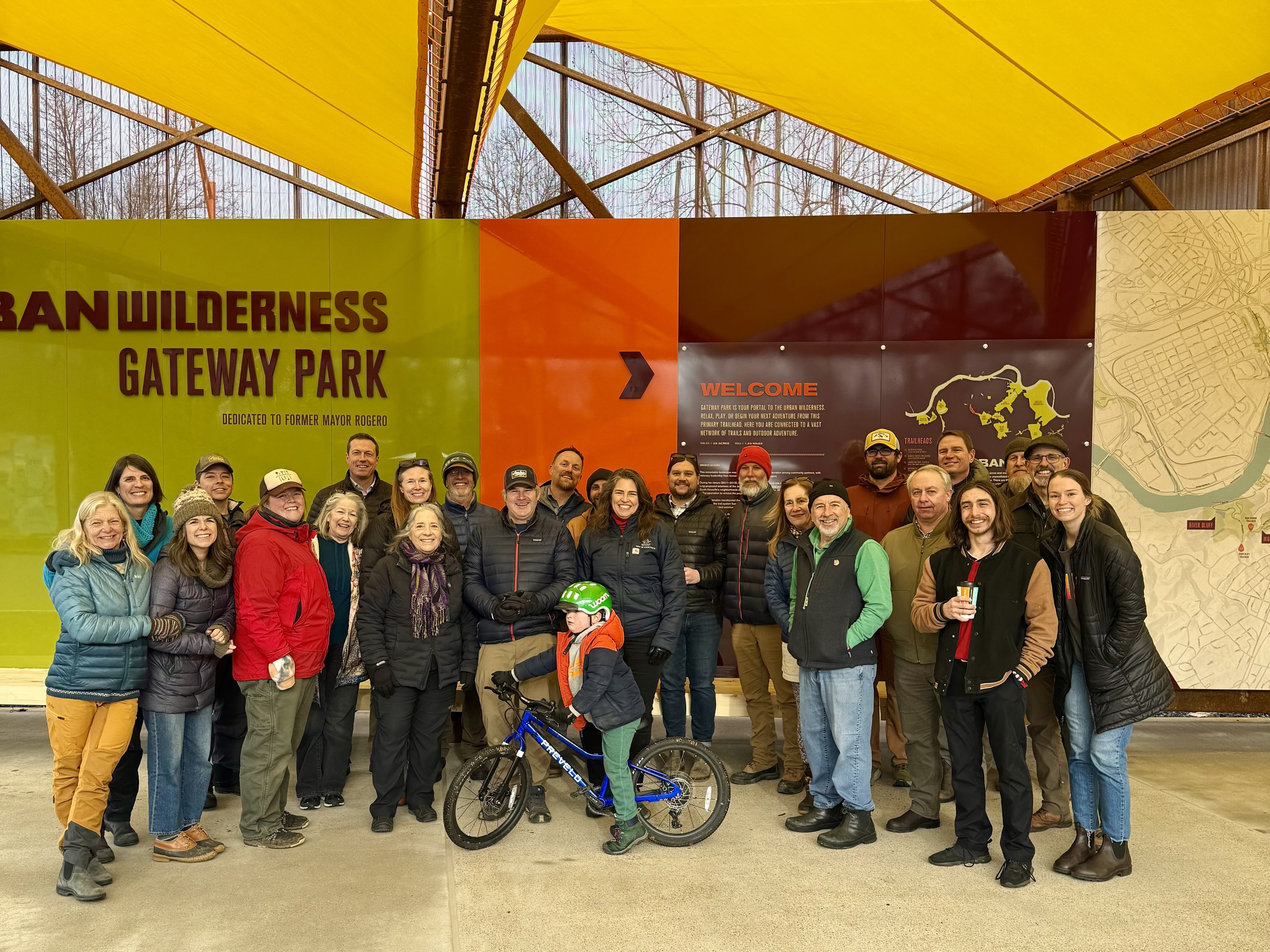 AMBC and community gathered in front of new pavilion at the Urban Wilderness Gateway Park.